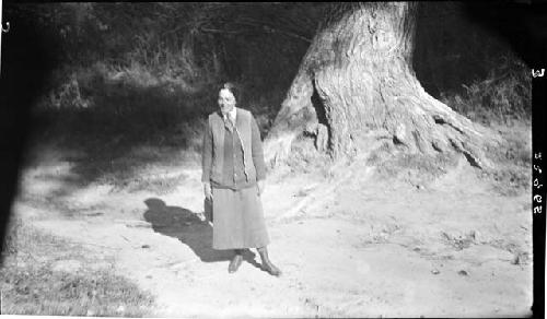 Janet Wulsin standing outside, near tree