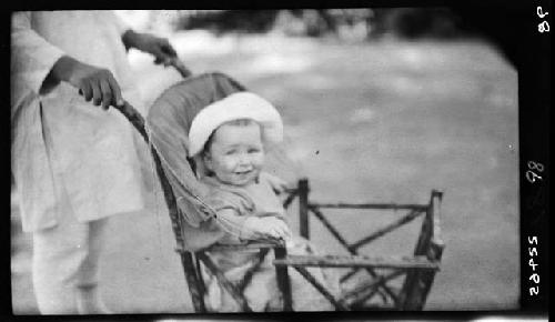 Child seated in stroller