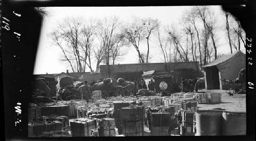 Packed cargo sitting in field