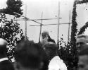 Father Pacifique delivering a sermon at the end of Procession of the Cross