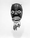 black wooden mask (go-ge); belonged to Bunga