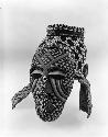 Painted ceremonial mask with beads and cowries