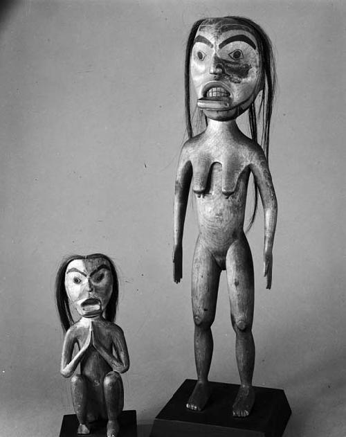 Wooden effigies of women with labret