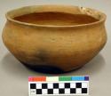Ceramic bowl, flared rim, flat base.