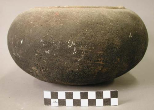 Ground stone vessel, grooved around rim