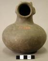 Ceramic vessel, hooded effigy jar, unidentified form, depression in base.