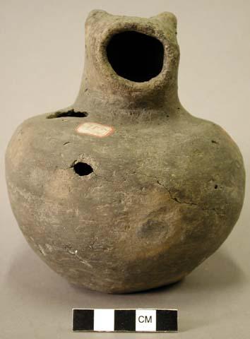 Ceramic complete effigy vessel, flat base, two body sherds missing