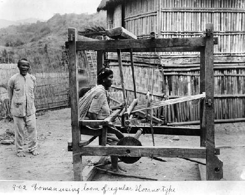 Woman using loom of regular Ilocano style