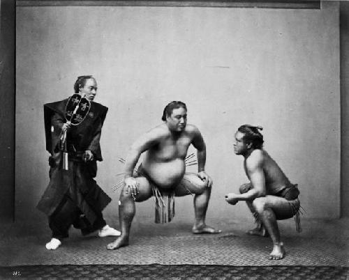 Three Japanese sumo wrestlers