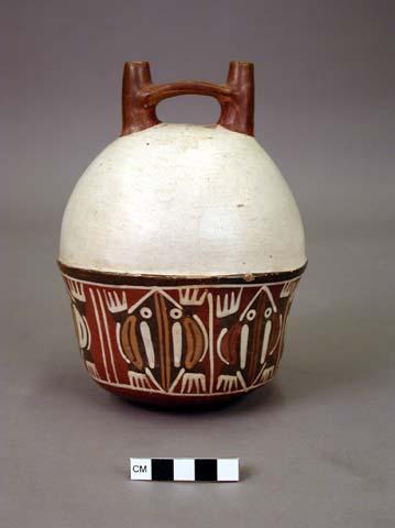 Early Nasca double spout bottle with "bowl and cap" form painted with a series of frogs.