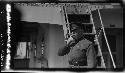 Man in uniform standing on boat deck