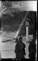 Woman pictured with outdoor staircase in background