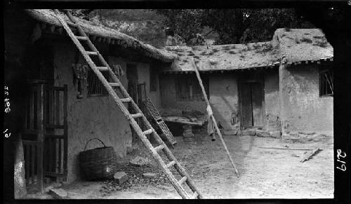 Courtyard, with ladders leading to rooftop