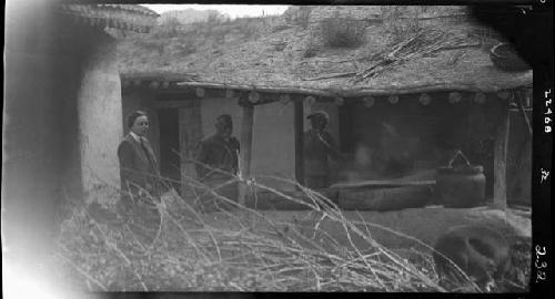 People stand outside building