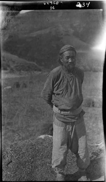 Man stands in field