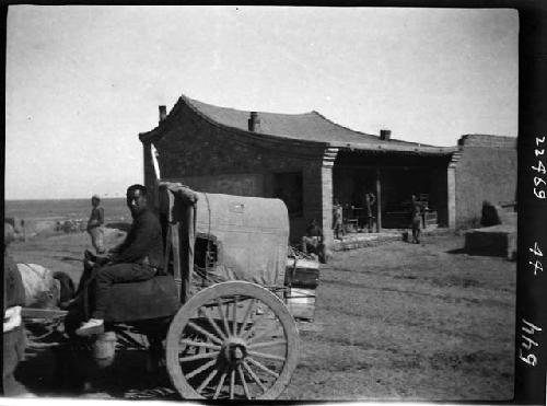 Man riding in wagon