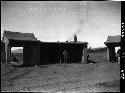 Man stands in front of building