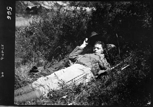 Man lying down in grass