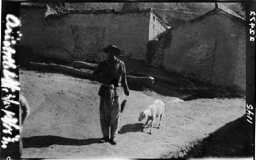 Man walks with dog