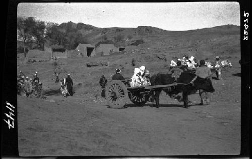 People riding in wagon