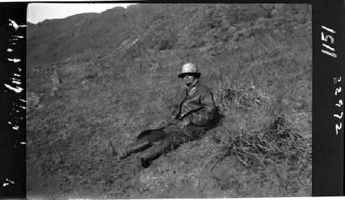 Janet Wulsin sits in field