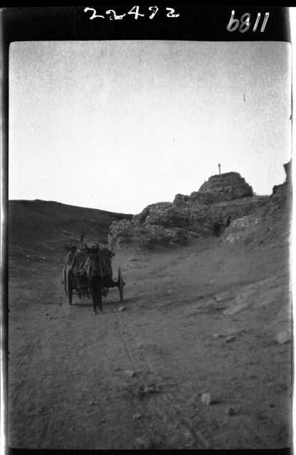 Wagon traveling down road