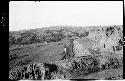 Man standing on natural ledge