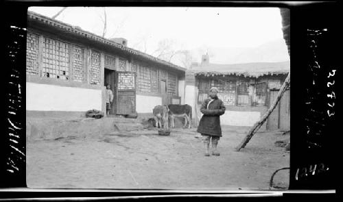 Man standing outside building