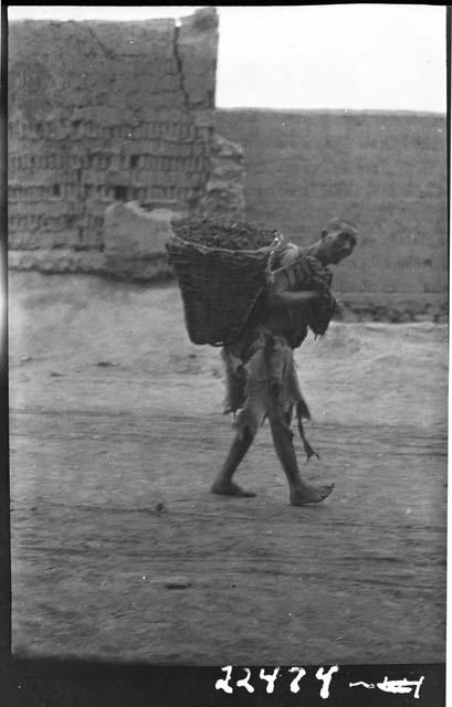 Man carrying basket