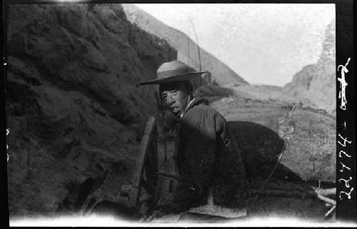 Man riding in wagon