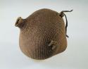 Twined basketry jug with pointed bottom and small spout