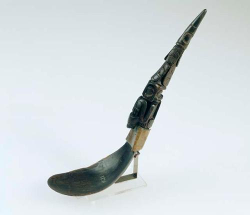 Ceremonial spoon depicting a frog, human faces, and a dragonfly