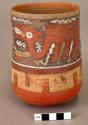 Ceramic vase painted in polychrome with two camelids, cacti, geometric motifs