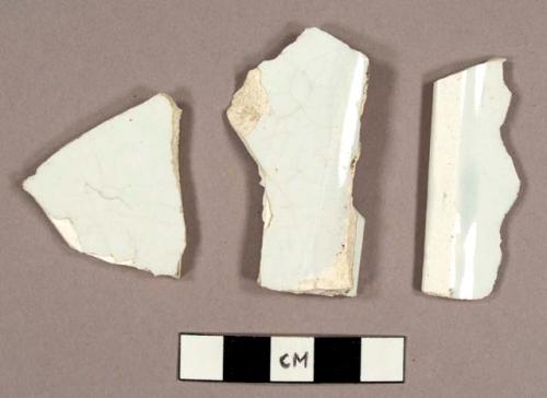 Fragments of pearlware platter, including two base fragments