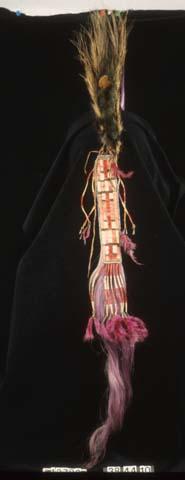 Roach (headdress) of dyed purple moosehair.