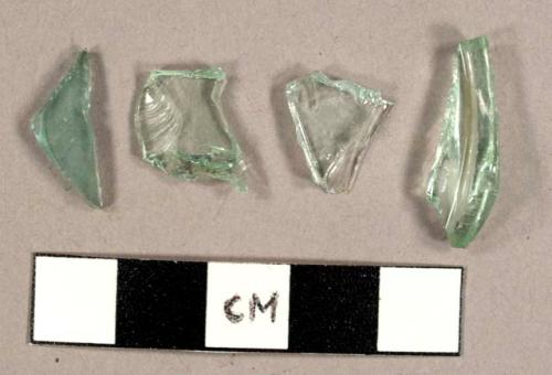 Aqua bottle glass fragments, including one partial base