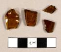 Brown bottle glass fragments, including one partial shoulder