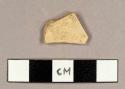 Earthenware rim sherd of plate, no glaze remaining