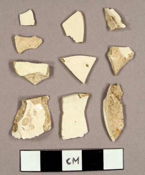 Creamware sherds, including partial bases for three different bowls and possibly a plate