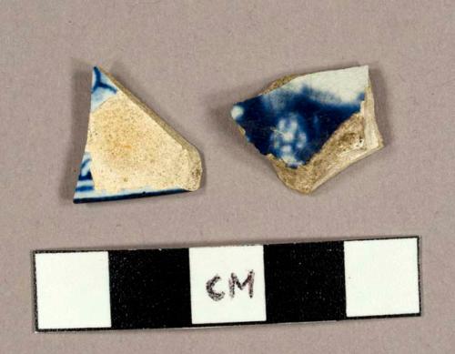 Blue transfer print pearlware sherds, including one plate rim