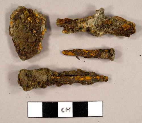 Iron fragments, including at least one cut nail and one rose-head nail