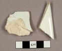 Whiteware sherds, including one bowl rim sherd and one plate base sherd