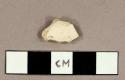 White kaolin pipe bowl fragment, unburned on interior