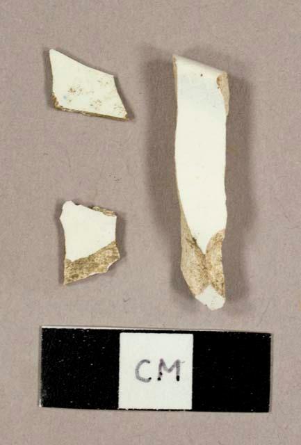 Whiteware sherds, including one plate rim sherd