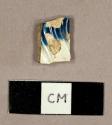 Blue scalloped-edge pearlware rim sherd of a plate