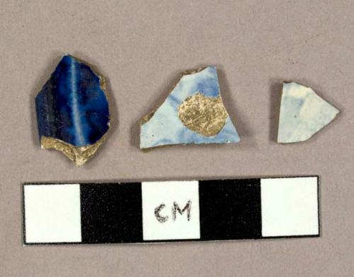 Blue transfer print earthenware sherds, including one flow-blue saucer rim sherd