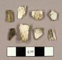 Whilte kaolin pipe bowl fragments, some unburned