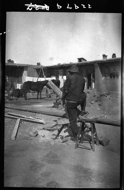 Man working with wood