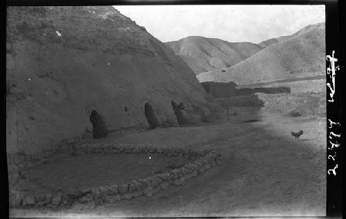 Doorways carved into hillside