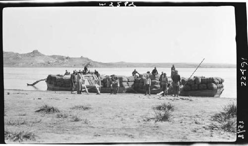 Traveling party at pier of Sher Tsui Tze (Shizuishan), with Zhen Yuan Guan in the background